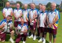 Harpenden celebrate with the Bob Vise Trophy. Picture: JENNIE REDFORD