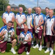 Harpenden celebrate with the Bob Vise Trophy. Picture: JENNIE REDFORD