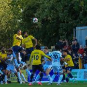 Ken Charles (left) heads in the second for St Albans City. Picture: JIM STANDEN