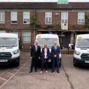 (L-R) Fergal Moane, Verulam School headteacher, Sarah Mitcherson Ridgeway Academy headteacher, Alan Gray, Ambition Education Trust CEO with the new electric minibuses