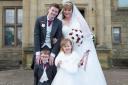 Rebecca Oldham on her wedding day with husband Steven and children Jack and Emily