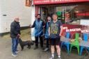 Adam Azim, second from right, has been left heartbroken over plans to turn Bushey Fish Bar into flats.