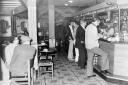 Enjoying a drink at the bar in June 1974