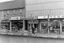 Baileys and neighbouring Caters supermarket in November 1974