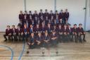 The champion football squads of Helena Romanes School with their trophies. Picture: HRS