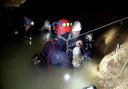 Chris Jewell with anaesthetist Dr Richard Harris and one of the boys during the cave rescue.