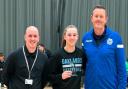 Caitlin Ryan with her award, flanked by Thomas Baker, Oaklands' head of academies, and Graham Hiscock. Picture: WOLVES BALL