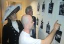 Christopher Hall showing the exhibition to High Sheriff Annie Brewster and Mayor Jamie Day