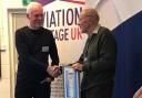 Ian Thirsk (left) receives his lifetime achievement award