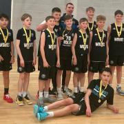 Oaklands Wolves U13 boys celebrate their tournament success. Picture: OAKLANDS BALL