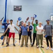 Residents enjoy a game of pickleball