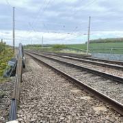 The train was travelling at 104 mph when it narrowly missed a train worker