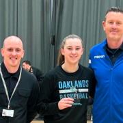 Caitlin Ryan with her award, flanked by Thomas Baker, Oaklands' head of academies, and Graham Hiscock. Picture: WOLVES BALL