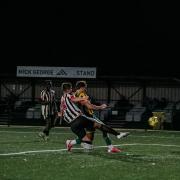 Jake Anthony scores Harpenden Town's equaliser in the FA Cup replay at St Ives. Picture: FREDDIE CLARK