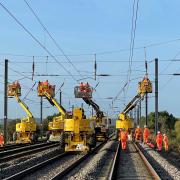 Engineers upgrading overhead lines