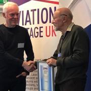 Ian Thirsk (left) receives his lifetime achievement award