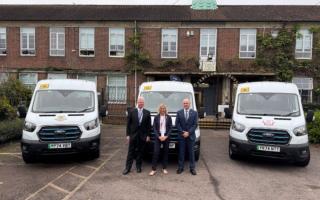 (L-R) Fergal Moane, Verulam School headteacher, Sarah Mitcherson Ridgeway Academy headteacher, Alan Gray, Ambition Education Trust CEO with the new electric minibuses