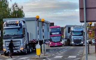 Traffic on the High Street,was brought to a stop as two travelling houses attempted to pass through the town.