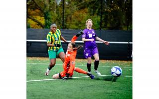 Sophia Amanor slides Harpenden Town in front against Stevenage. Picture: FREDDIE CLARK